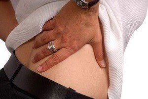 Что делать если болит спина в правом нижнем углу